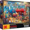 RoseArt – Kodak Premium Collector – Main Street Bakery – 2000 Piece Jigsaw Puzzle for Adults(Train Station)